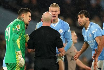 Manchester City charged by FA after players surround referee against Spurs