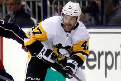 International Ice Hockey Federation to mandate neck guards after the death of a player by skate cut