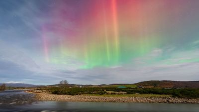 Incredibly rare sighting of orange Northern Lights captured in Scotland