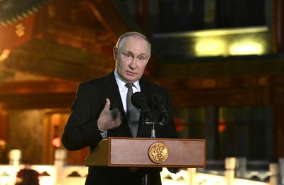 Putin Says Women Must Have More Than Eight Children To Save Russia's Population
