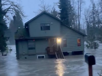 One dead as atmospheric rivers bring ‘pineapple express’ rain and floods to US Northwest