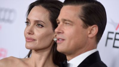 Angelina Jolie and Brad Pitt's fresh white tiles and stainless steel combination in their clean kitchen is giving us clean minimalism inspiration