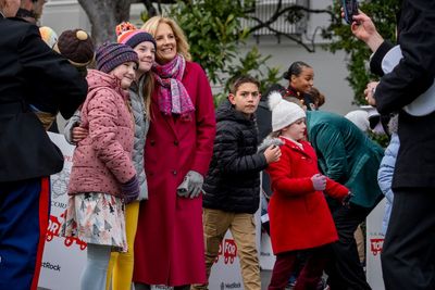 Jill Biden and military kids sort toys the White House donated to the Marine Corps Reserve program