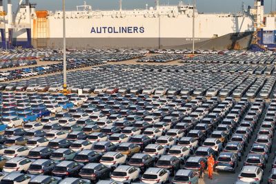 China's exports in November edged higher for the first time in 7 months, while imports fell