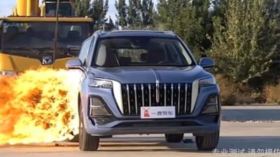 Watch This Chinese SUV Drive Away After Getting Hit By A Flaming Wrecking Ball