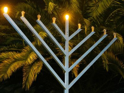This year's Hanukkah celebrations are tempered by Israel's war with Hamas
