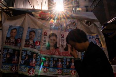 Hong Kong's new election law thins the candidate pool, giving voters little option in Sunday's polls