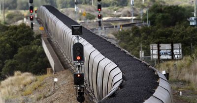 Coal train derails and sparks a two-day bushfire that is still ongoing