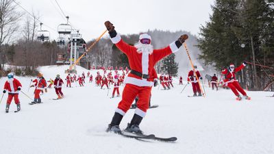 Unique ways Americans celebrate the holidays, from skiing Santas to Festivus feats