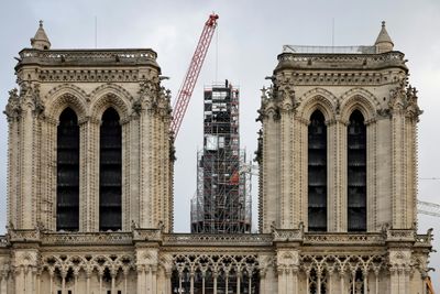 France's Macron Says Notre Dame Cathedral To Reopen On Time