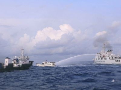 Philippines says the Chinese coast guard attacked its vessels for a second day