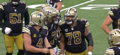 Derek Carr and Saints center Erik McCoy got into a heated exchange while walking off the field