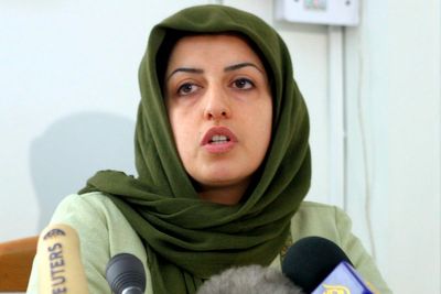 Teenage children of jailed Iranian activist Narges Mohammadi accept Nobel Peace Prize on her behalf