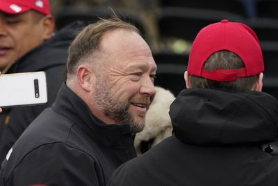 Elon Musk brings conspiracy theorist Alex Jones back to X following poll