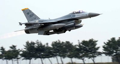 Officials say a US pilot safely ejected before his F-16 crashed into the sea off South Korea