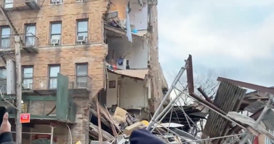 Dogs sniff rubble after 6-storey Bronx building suffers huge collapse