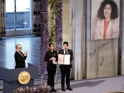 Children of jailed Iranian activist Narges Mohammadi accept her Nobel Peace Prize