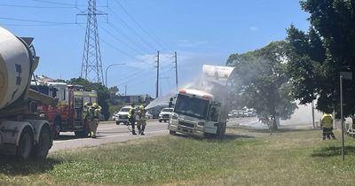 Garbage truck catches on fire and dumps load