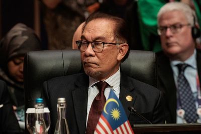Malaysian leader appoints technocrat as his deputy finance minister in Cabinet shuffle