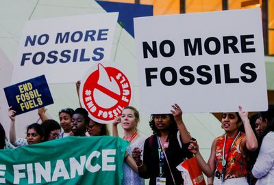 COP28 climate talks go into overtime amid standoff over fossil fuels