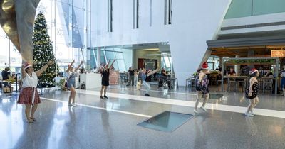 Festive flash mob at Canberra Airport spreads some Christmas joy