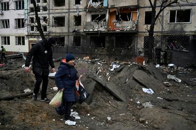 Strikes On Kyiv Wound Dozens As Ukraine Pleads For Aid