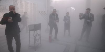 Why did a far-right MP take a fire extinguisher to a Jewish menorah just as Poland's new government was being voted into power?