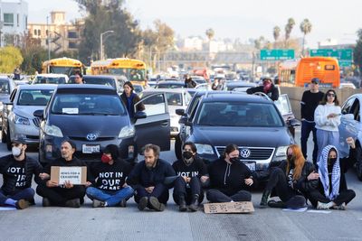 Dozens of Jewish protesters block LA freeway as they call for Gaza ceasefire