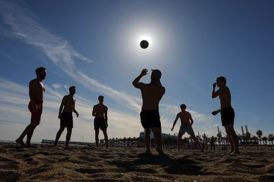 Spain swelters in extreme December heat as temperatures soar to record of nearly 30C