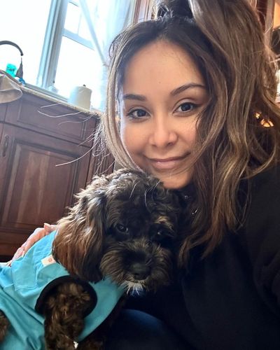Snooki Shares Sweet Moments with Adorable Puppy in Blue Shirt