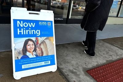 US applications for jobless benefits fall again as labor market continues to thrive