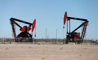 Oil Soars as Dollar Weakens, IEA Boosts Demand Forecast