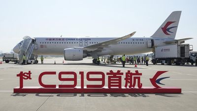 China steps up competition with first international flight of homegrown aircraft