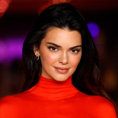 Kendall Jenner's cocktail bar perfectly balances 'grandeur and minimalism' – experts love her use of dark oak shelving