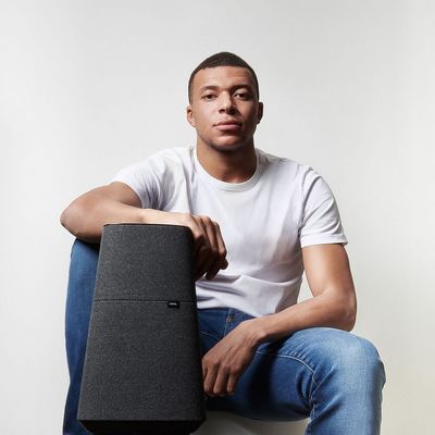 Kylian Mbappe: Epitome of Effortless Cool in White Tee, Blue Pants