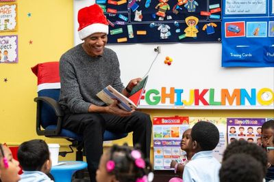 Obama surprises classroom of schoolchildren: ‘I am skinny Santa’