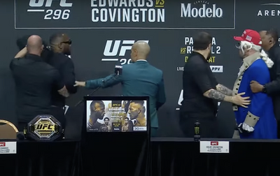 Video: Leon Edwards gets heated, throws water bottle at Colby Covington during UFC 296 press conference