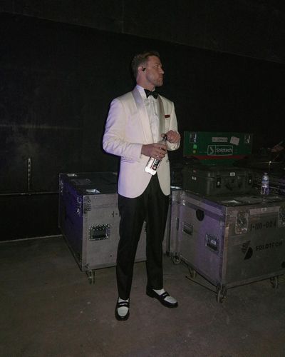 Justin Timberlake Electrifies Stage in White Coat to Roaring Crowd