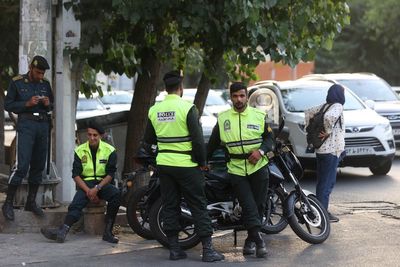 Gunmen kill 11 people in attack on police station in Iran