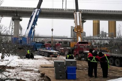 515 injured in a Beijing rail collision as heavy snow hits the Chinese capital