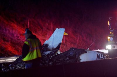 A plane hit powerlines over I-26 in North Carolina, then burst into flame. Nobody was seriously hurt