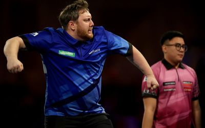 Plumber Cameron Menzies goes from fixing sink to winning at World Darts Championship in one day