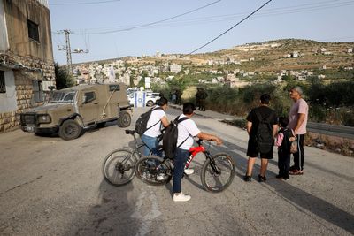 Three brothers in the West Bank, kept apart by Israel’s war