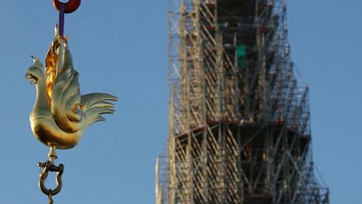 Paris's Notre-Dame spire is crowned by new golden rooster to symbolize rebirth