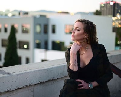 Katie Cassidy: Radiating Glamour and Elegance in the Cityscape Charisma