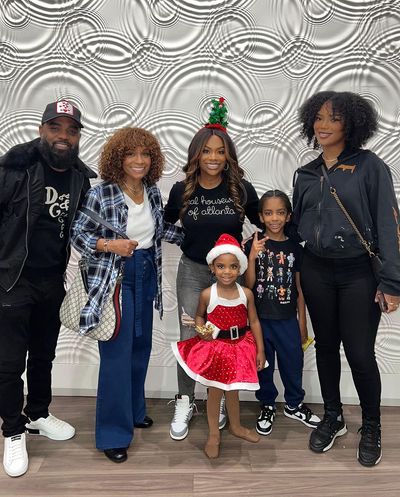 Kandi Burruss Enjoys Christmas Holiday with Family and Festive Backdrop