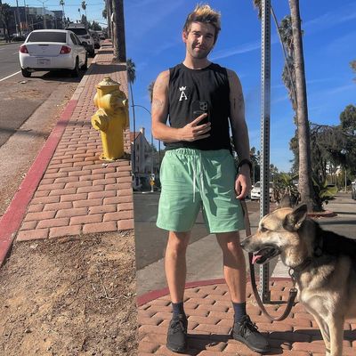 Jack Griffo Takes Mirror Selfie with Dog on the Sidewalk
