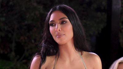 Black Bikini Summer May Be Over, But Kim Kardashian Is Bringing The Look Back For The Holidays
