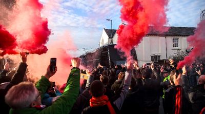 Liverpool react after Manchester United bus is damaged by bottle outside Anfield