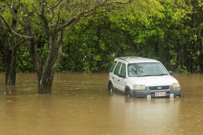 Hundreds evacuated as floods ravage northeastern Australia